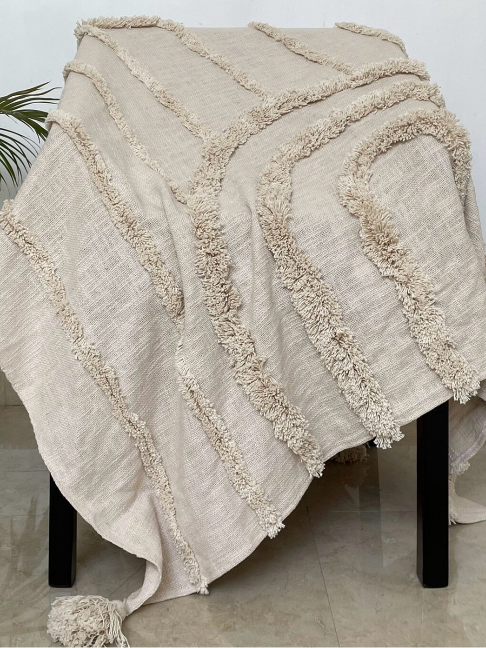 Urban Outfitters Cream Textured Tassel Table Throw
